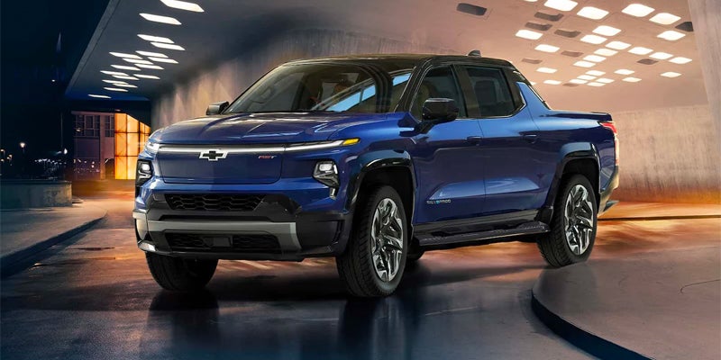 Blue 2024 Silverado EV parked on pavement
